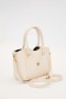 krem  metal aksesuarlı el çanta
