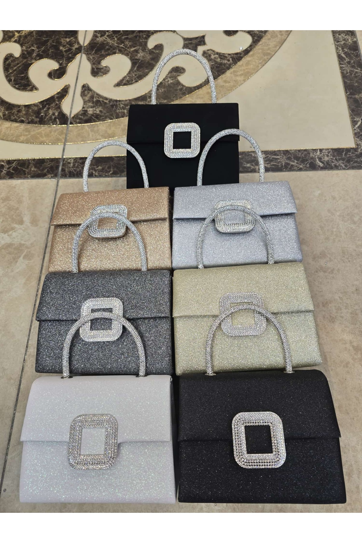 şık el çantası metal taşlı